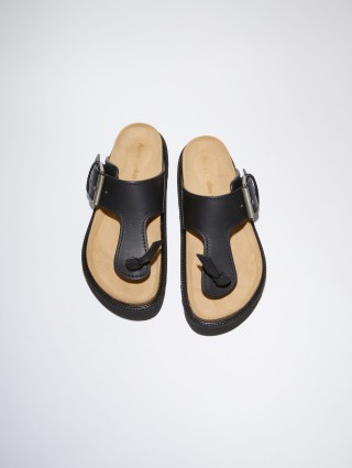 Черные шлепанцы Acne Studios из кожи: фото 1 - Invogue