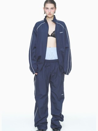 Синие спортивные брюки PUSHBUTTON: фото 1 - Invogue