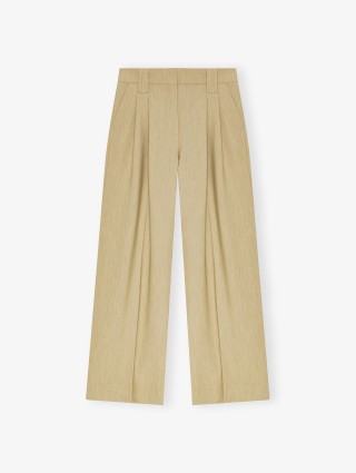 Бежеві брюки Ganni саржеві: фото - Invogue