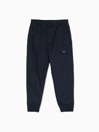 Синие брюки EMPORIO ARMANI с металлической эмблемой: фото - Invogue