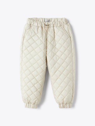 Бежевые брюки IL GUFO стеганые: фото - Invogue