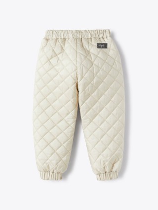 Бежевые брюки IL GUFO стеганые: фото 1 - Invogue