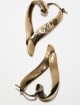 Золотисті сережки Acne Studios у формі сердець: фото 3 - Invogue