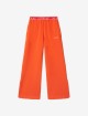Оранжевые брюки OFF WHITE с логотипом: фото - Invogue