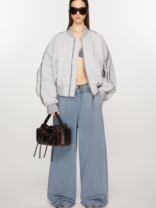 Голубые спортивные брюки Acne Studios: фото 3 - Invogue