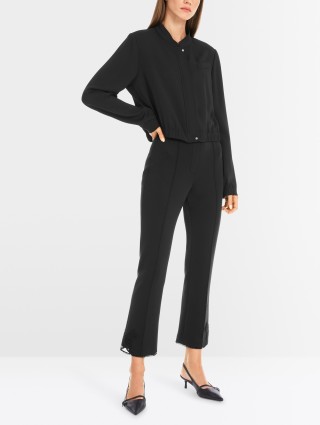 Черные брюки Marc Cain из мягкого трикотажа: фото 1 - Invogue