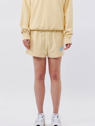 Жёлтые шорты SPORTY&RICH: фото 1 - Invogue