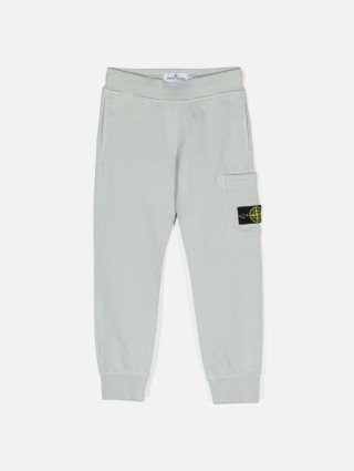 Серые спортивные брюки STONE ISLAND с нашивкой: фото - Invogue