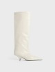 Кремові чоботи Totême на танкетці: фото Кремові чоботи Totême на танкетці: фото - Invogue